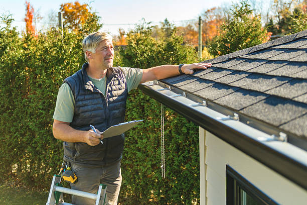 Professional Storm Damage Roof Repair technician working in Ashland, OR